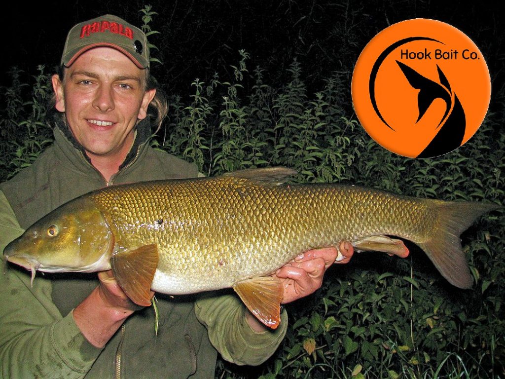 Andrew Kennedy with a 12lb+ specimen barbel caught on the Hook Bait Company baits